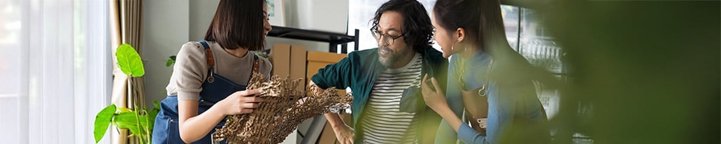business owners selecting protective packaging materials
