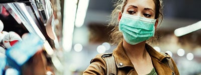 a female shopper wearing face mask