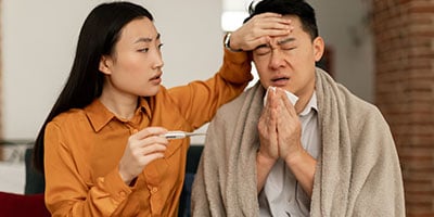 a person taking care of a sick person