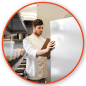 commercial kitchen staff checking inventory
