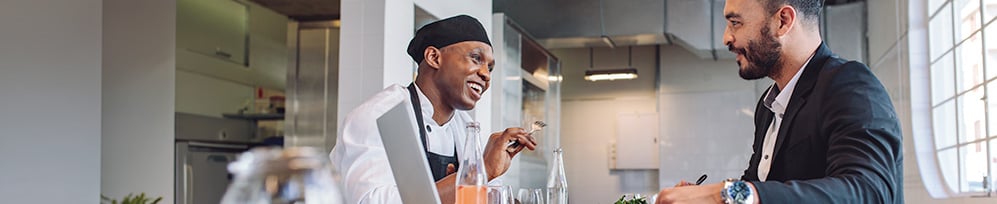 chef talking to a consultant on kitchen design