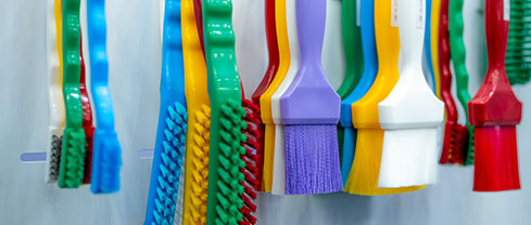 color-coordinated kitchen tools for food safety