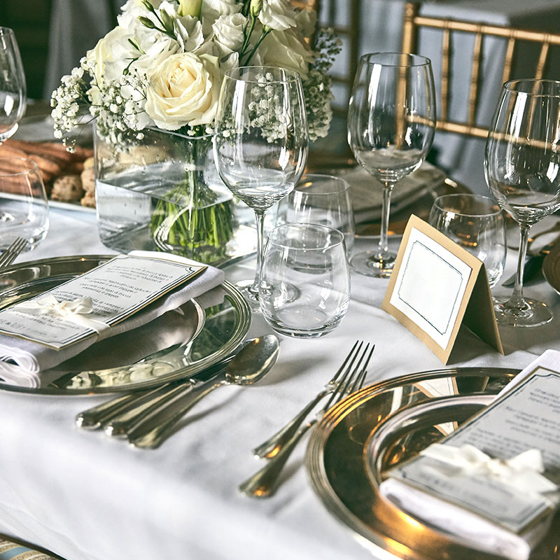 catering event decor with customized menu and name tag