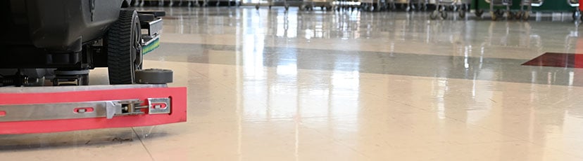 auto scrubber on student assembly floor