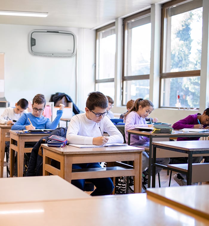 a K12 classroom with air purifier in the back wall
