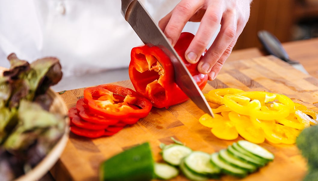 chef chopping fresh ingredients