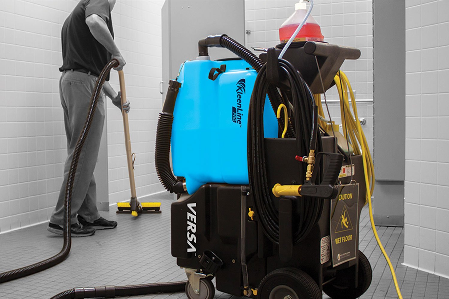 KleenLine Versa cleaning caddy in action in the restroom