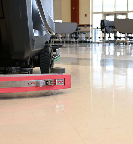 auto scrubber on school floor