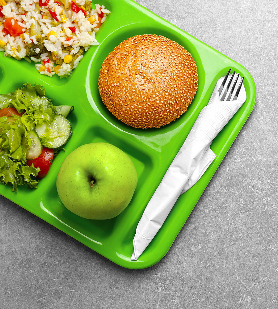 a school lunch tray with a balanced meal on it