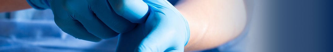 PPE-person wearing diposable gloves